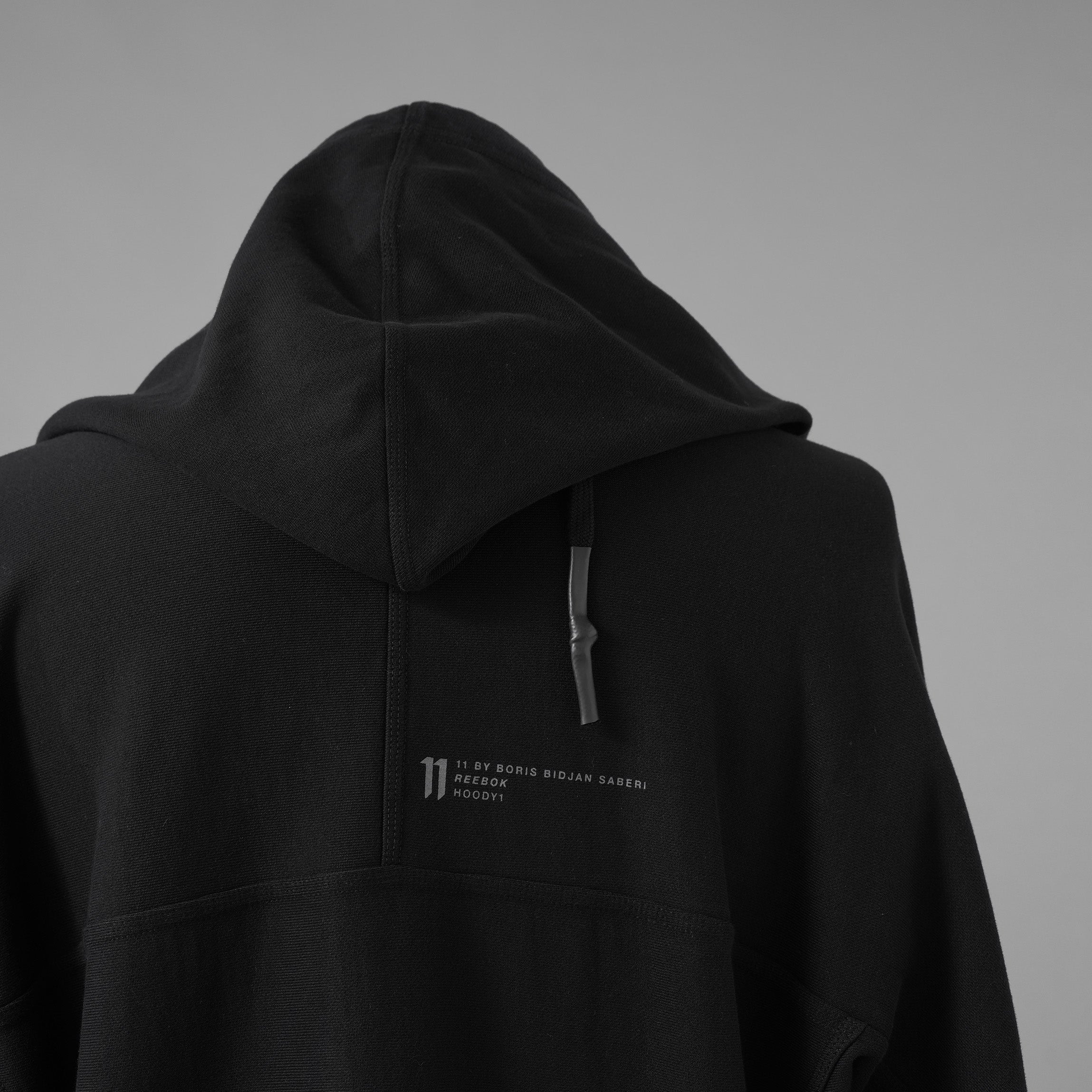 11 BY BORIS BIDJAN SABERI × Reeboc コラボ / 美品 25SS LTD CONSTRUCTED HOODIE パーカー / RMBB 00S C 99FLE001 / size M (BLACK)
