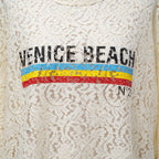 N°21 ヌメロヴェントゥーノ / 22SS プリントレースTシャツ / 22S-G141-4123 / size 40 (IVORY) レディース